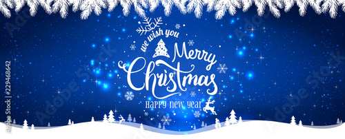 Christmas and New Year Typographical on shiny Xmas background with winter landscape with snowflakes, light, stars.