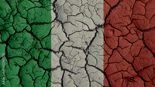 Political Crisis Or Environmental Concept: Mud Cracks With Italy Flag