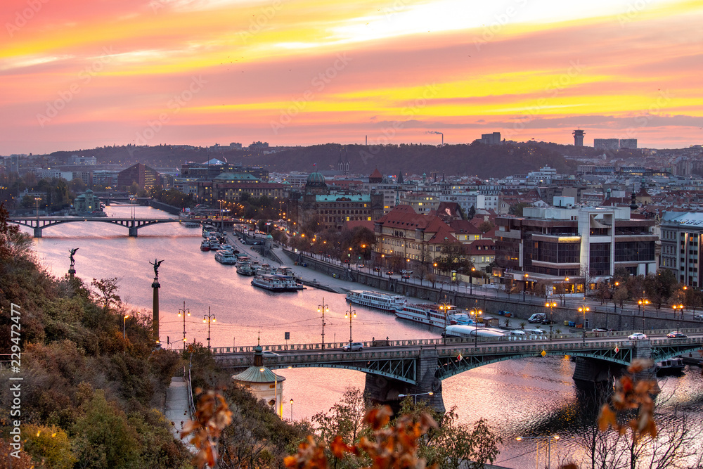 Fototapeta premium Moldau river embankment, Old town, Prague (UNESCO), Czech republic - town at sunrise in the autumn morning