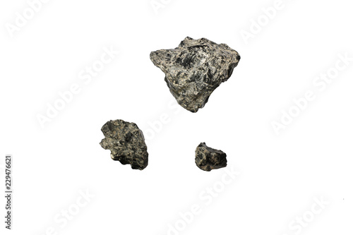Fototapeta Naklejka Na Ścianę i Meble -  A piece of a meteorite that fell from the sky, split from the background white.