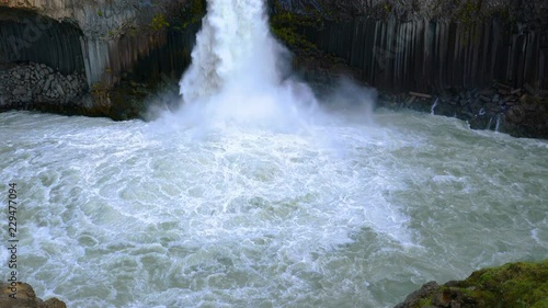 Summer view of Aldeyjarfoss waterfall at the Bardardalur valley in Iceland with the Natural Basaltic Columns photo