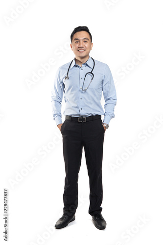 Professional asian doctor posing