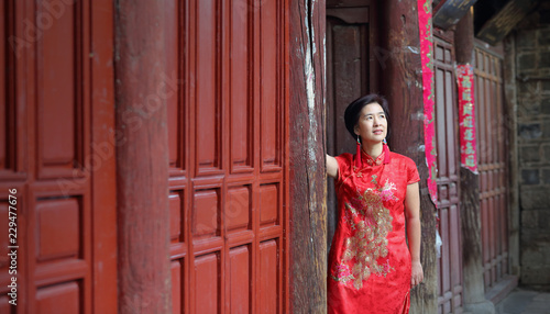 Female Tourist with Chinese Traditional Clothing in Lijiang Old town ,Yunnan, China.