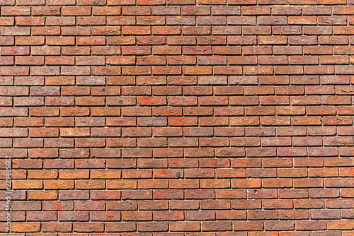 Background from a regularly red brick wall