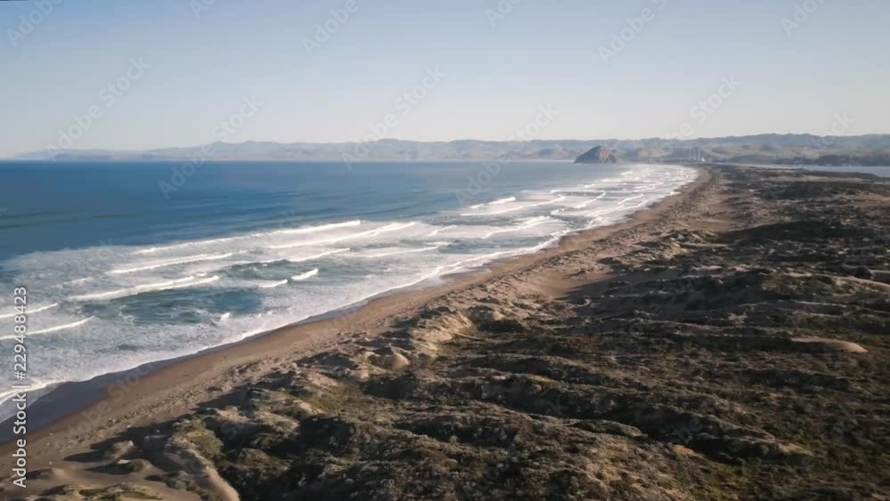 Montana de Oro State Park Beach and city of Morro Bay in the distance. Montana de Oro State Park Beach and city of Morro Bay in the distance.