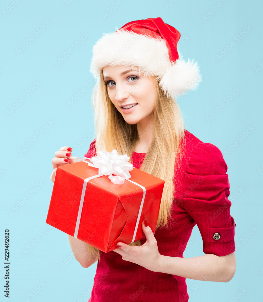 Portrait of attractive blond woman over Christmas background with snow. Portrait of attractive blond woman over Christmas background with snow.