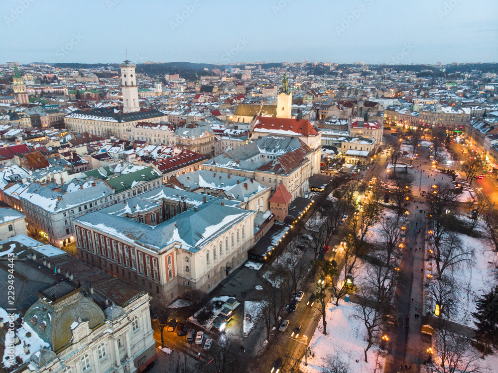 aerial view of city in night time. streets in car lights.