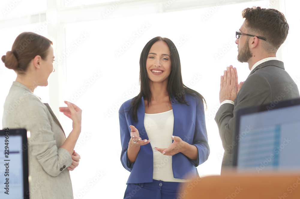 friendly business team having discussion in office friendly business team having discussion in office