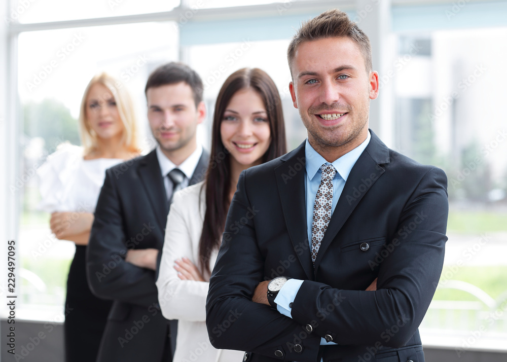 closeup. leader standing in front of the business team closeup. leader standing in front of the business team
