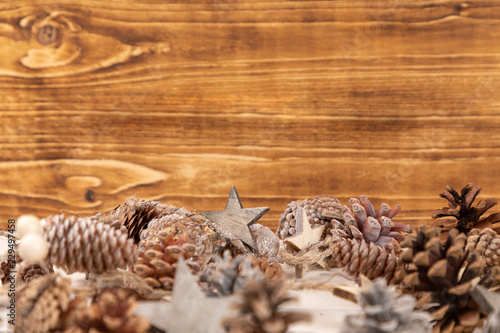 christmas frame background with pine cones