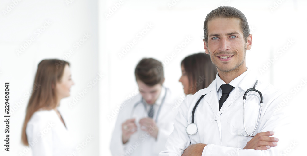 smiling doctor therapist on blurred background. smiling doctor therapist on blurred background.