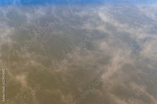 Fog over a water close-up © olyasolodenko