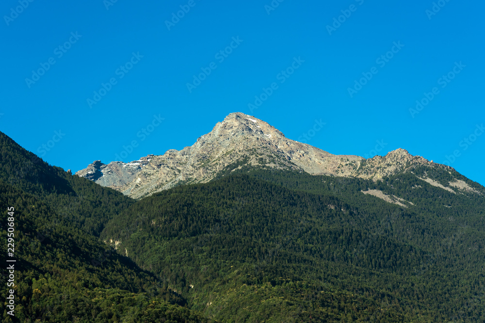 Mountain peaks and sky in Alps, Italy.