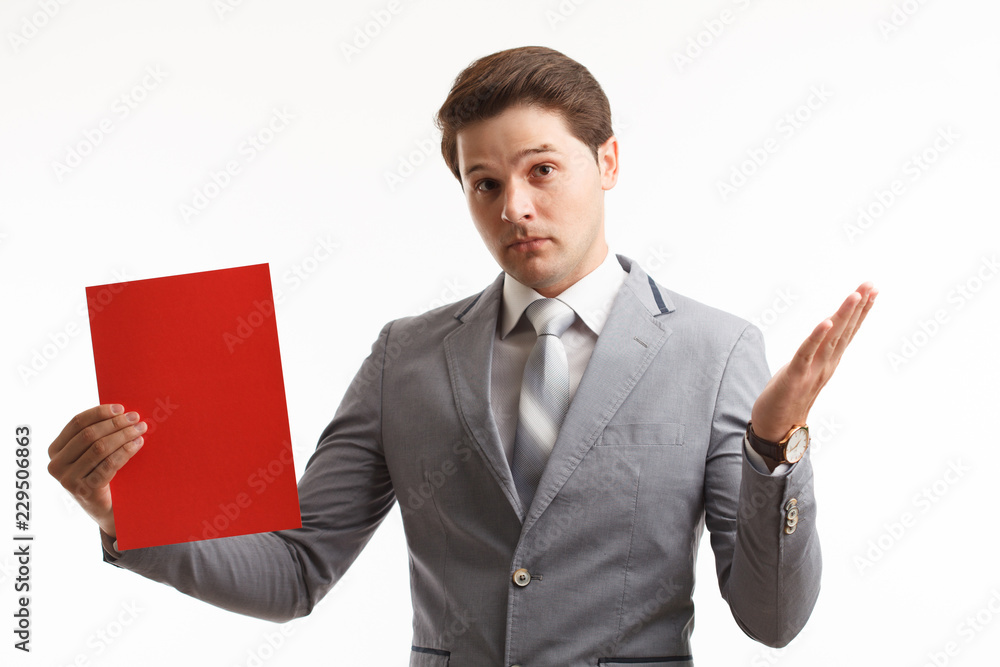 Businessman showing signboard. In studio on a white background Businessman showing signboard. In studio on a white background