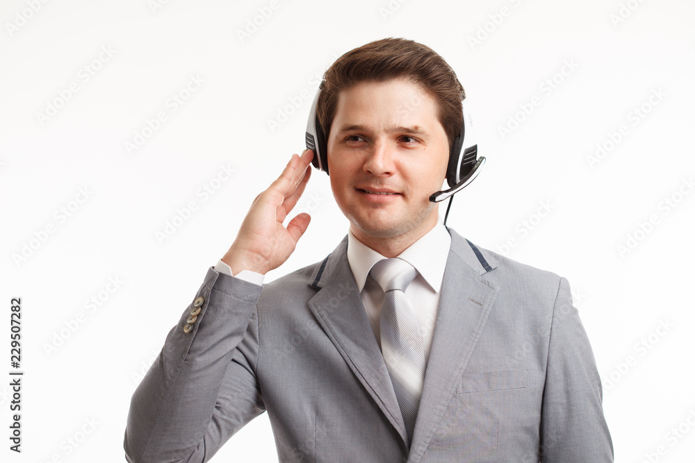 Customer support phone operator at office. In a studio. Customer support phone operator at office. In a studio.