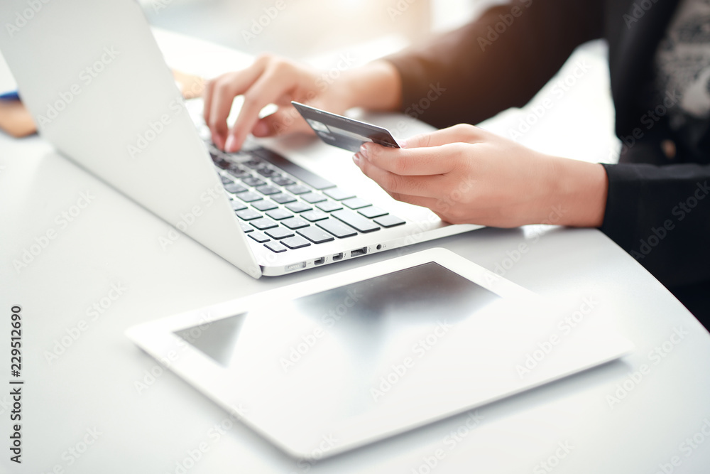 shopping and online payment by using laptop computer and tablet with credit card shopping and online payment by using laptop computer and tablet with credit card