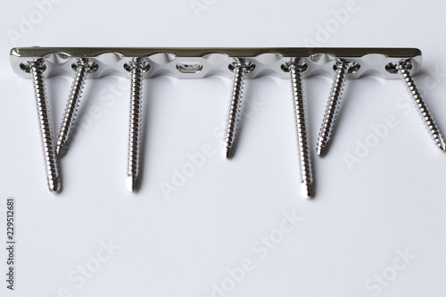 Surgical instruments in traumatology for osteosintesis in case of bone fracture photo