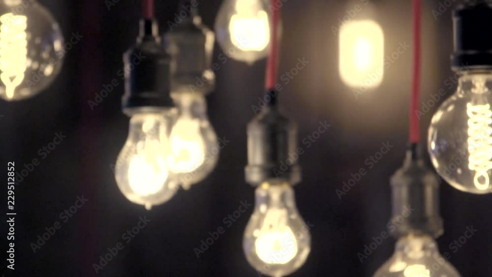 Retro light bulb with unusual spiral. Edison lamps in loft style. Retro light bulb with unusual spiral. Edison lamps in loft style.