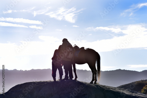 Unidentified horse riders with his horse near at the Mount Bromo  East Java  Indonesia