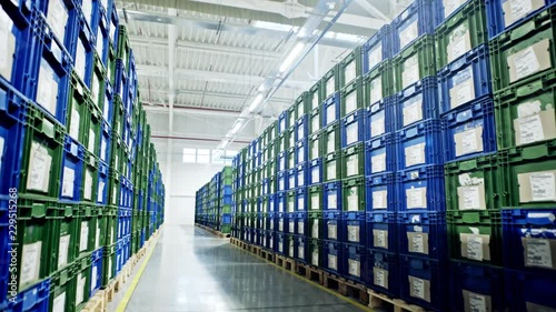 Large group of plastic boxes in a warehouse