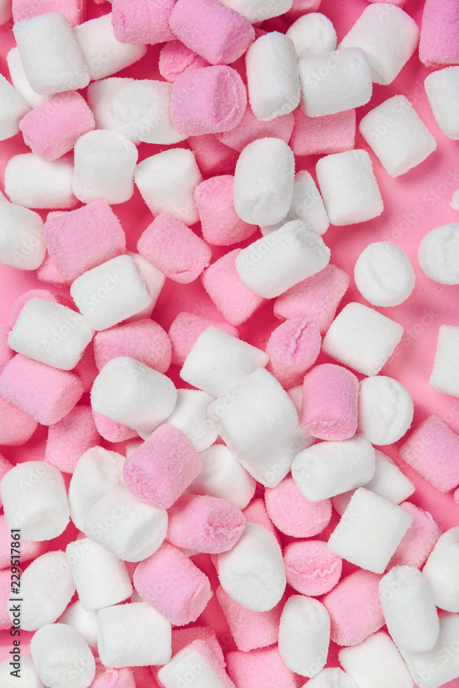 Marshmallows on pink background Marshmallows on pink background