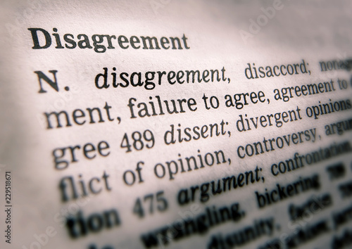THESAURUS PAGE SHOWING DEFINITION OF WORD DISAGREEMENT photo