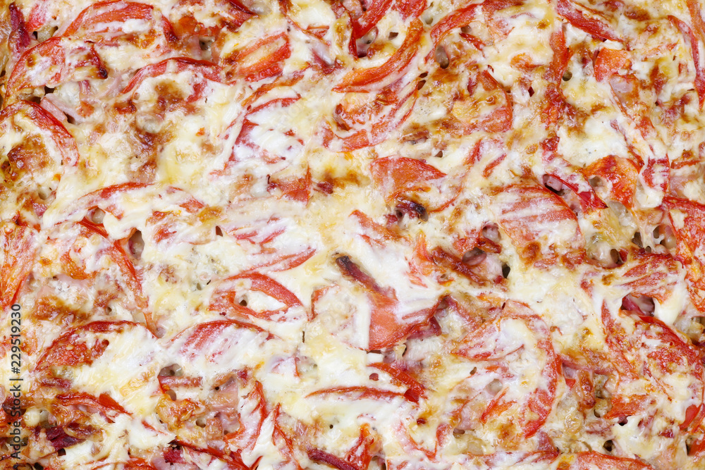Oven baked potato with meat cheese and tomatoes. This is the endof the process of cooking meat in French style Oven baked potato with meat cheese and tomatoes. This is the endof the process of cooking meat in French style