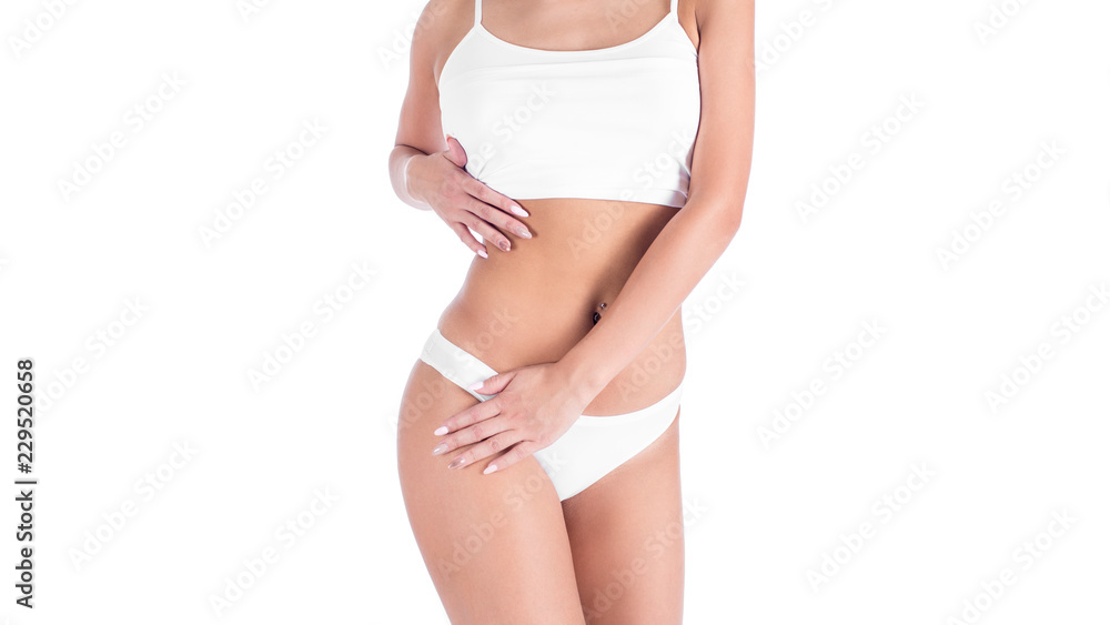 Woman applying moisturizer cream lotion on belly. Getting rid of belly fat and weight loss. Young woman wear white underwear.