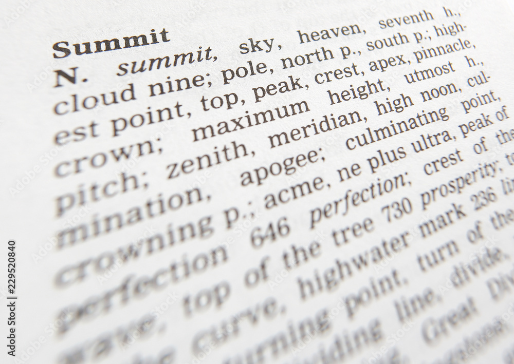 CLOSE UP OF DICTIONARY PAGE SHOWING DEFINITION OF THE WORD SUMMIT CLOSE UP OF DICTIONARY PAGE SHOWING DEFINITION OF THE WORD SUMMIT