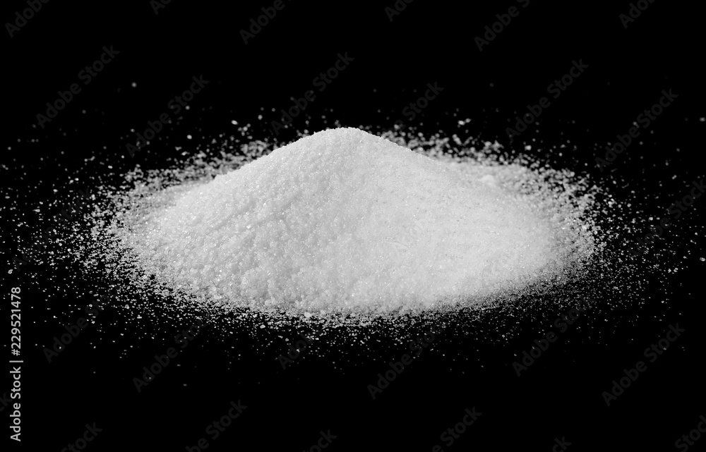 Crystal sugar pile isolated on black background with clipping path Crystal sugar pile isolated on black background with clipping path