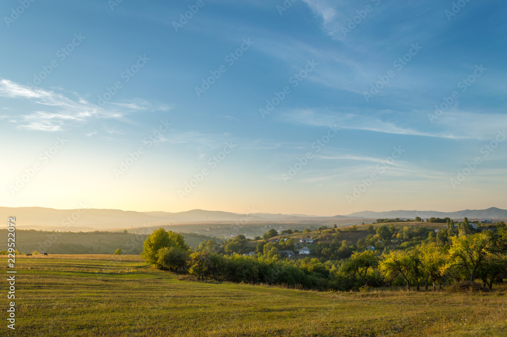 High View of Hill and Mountain Rural with Blue Sky at Sunset