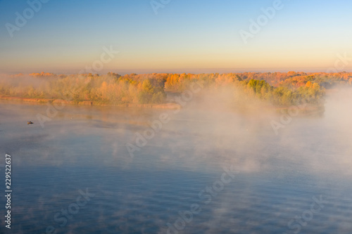 Fog over the water on a river Dnieper on autumn