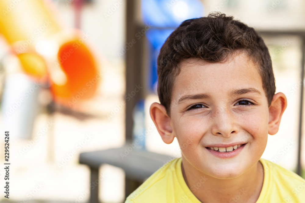 Portrait of happy cute child boy outdoors. Concept of happy family or successful adoption or parenting. Portrait of happy cute child boy outdoors. Concept of happy family or successful adoption or parenting.