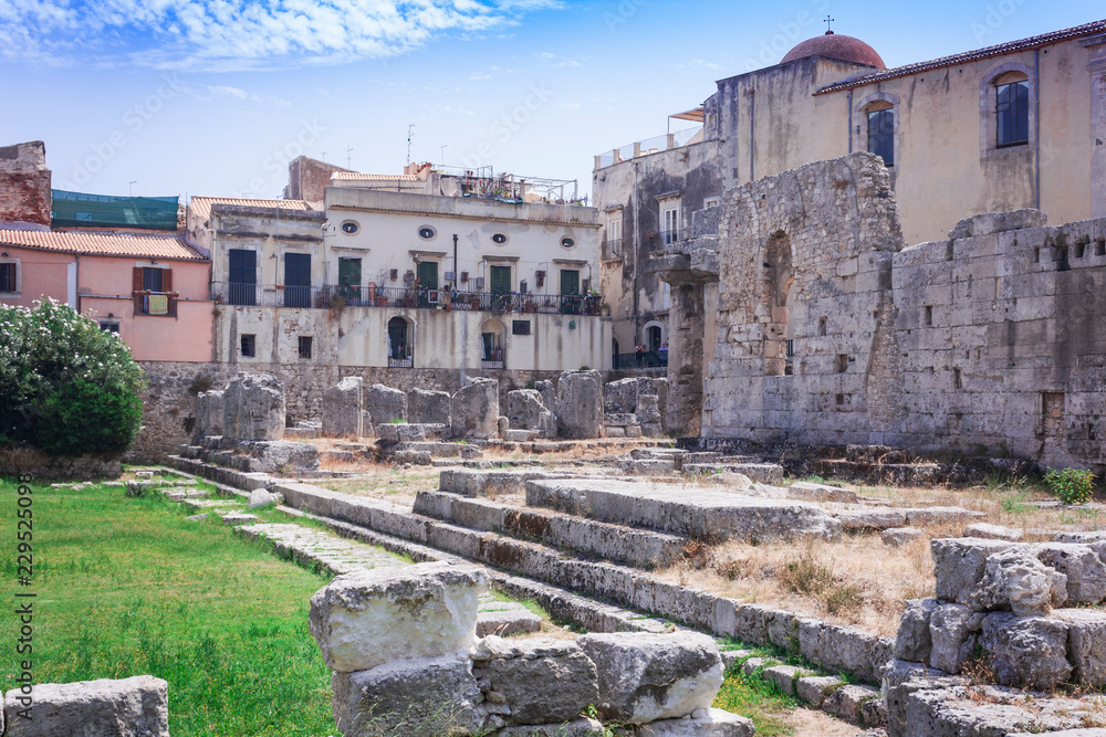 Ruins of temple of Apollo in Ortygia (Ortigia) Island, Syracuse, Sicily, Italy - ancient square 