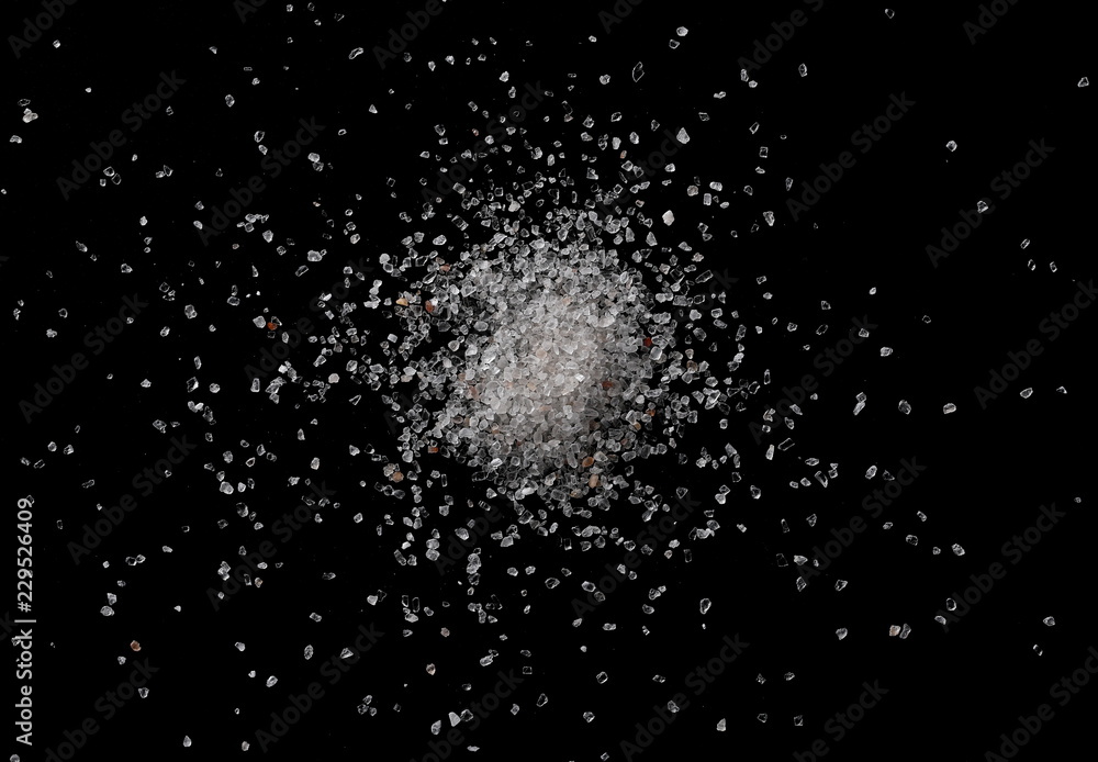 Himalayan salt pile isolated on black background, top view Himalayan salt pile isolated on black background, top view