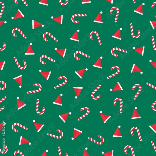 X mas things seamless pattern gift wrap paper. Candy cane  santa hat. Green rectangle background. Flat style. 
