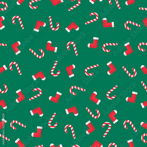 X'mas things seamless pattern gift wrap paper. Candy cane, sock. Green rectangle background. Flat style. 