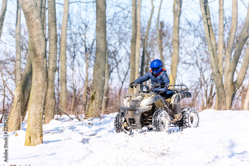 Travel in the winter on the ATV. Beautiful winter nature.