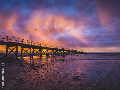 Curvy Sunlight Rays over Pier