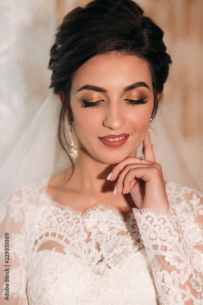 Happy bride in her wedding day. Makeup and hairstyle Happy bride in her wedding day. Makeup and hairstyle