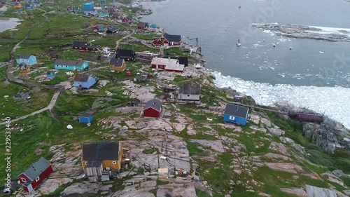 4k 60fps Greenland Aerial view of Ilimanaq fishing village above colored house photo