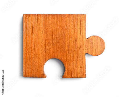 Wooden puzzle piece with te...