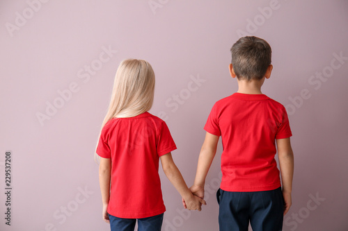 Boy and girl in t-shirts ho...
