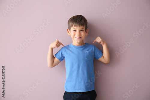 Cute little boy pointing at...