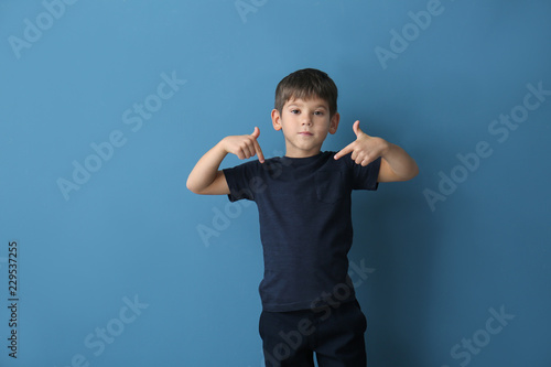 Cute little boy pointing at...