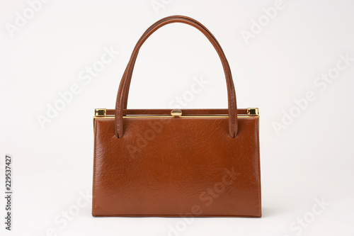 BROWN LADIES LEATHER HANDBAG ISOLATED ON WHITE BACKGROUND