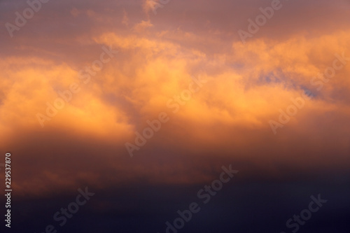 RED AND ORANGE CLOUDS AT SUNSET