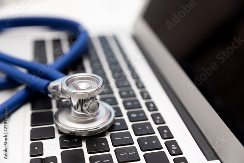 Stethoscope on laptop keyboard