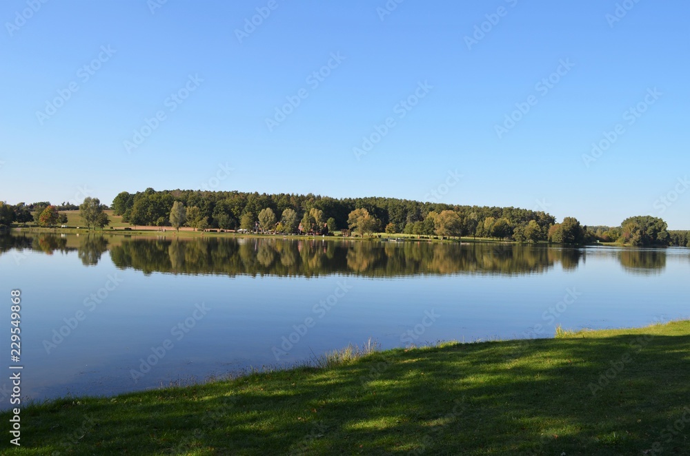 large lake with two shores, water in natural environment