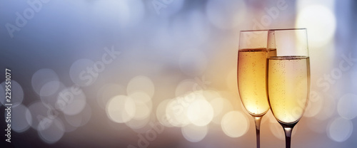 Clink glasses with champagne for a new year